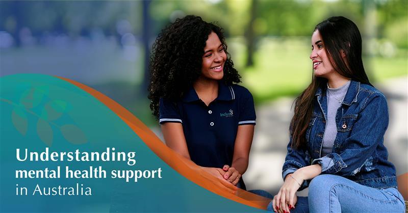 Mental Health Support, Two women are sitting outside smiling and talking, one wearing an Incluso Services shirt. 